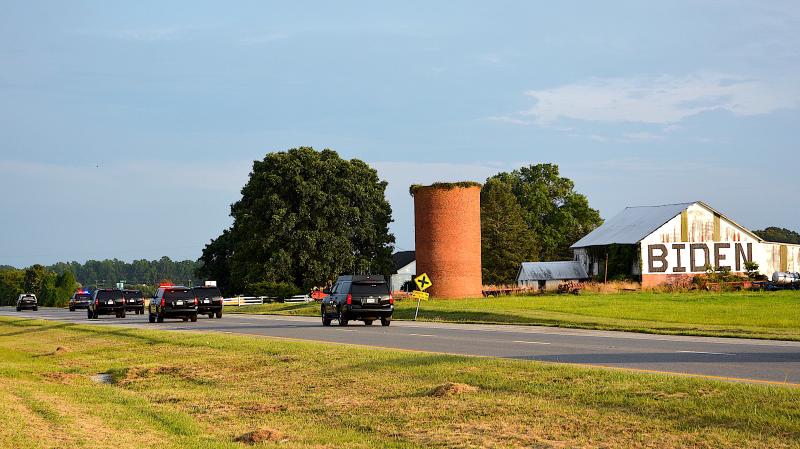 President Biden’s motorcade speeds past the “Biden” barn while heading south on Route 1 in 2023. Owner Don Clifton, the current Delaware secretary of agriculture, said he has never spoken to Biden about the sign, but he heard that a photo of it was hanging in the White House. CHRIS FLOOD PHOTO